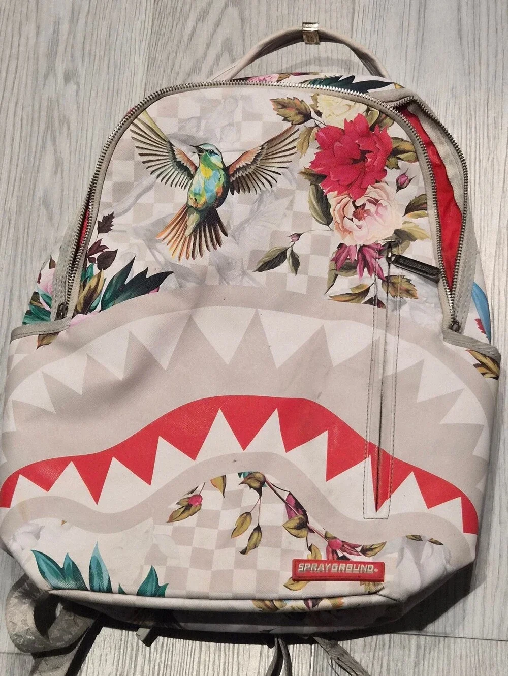 Sprayground Floral Shark-Graphic White Backpack with Red Accent